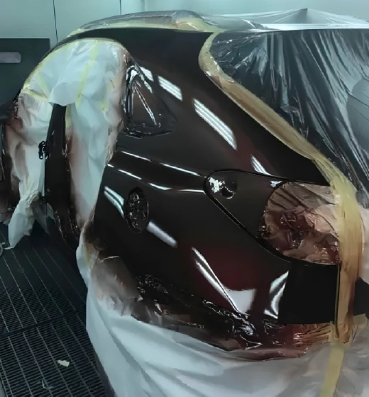 Automotive paint booth spray