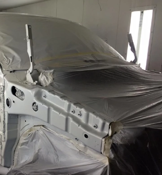 Primed car frame section