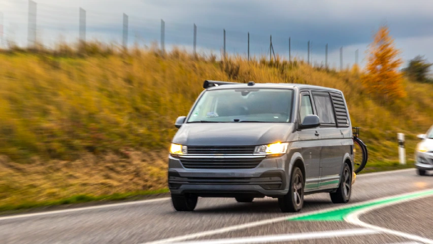 Grey van road travel